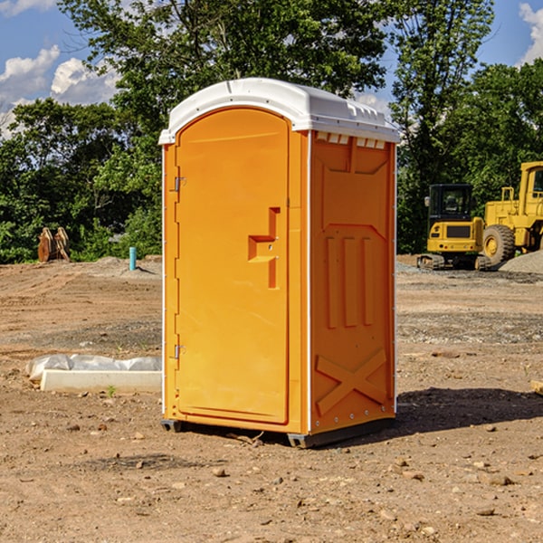 how often are the portable restrooms cleaned and serviced during a rental period in Errol